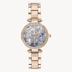 Named for the glamorous New York City streets, the Coach Park watch is a delicate evening style that shimmers with Swarovski crystals. It is finished with a mother-of-pearl dial featuring an artful mosaic of Coach's signature. The timepiece features a 26 mm carnation case that joins a bracelet with a deployment closure. The mineral crystal dial works on quartz movement and has 30 m water resistance.