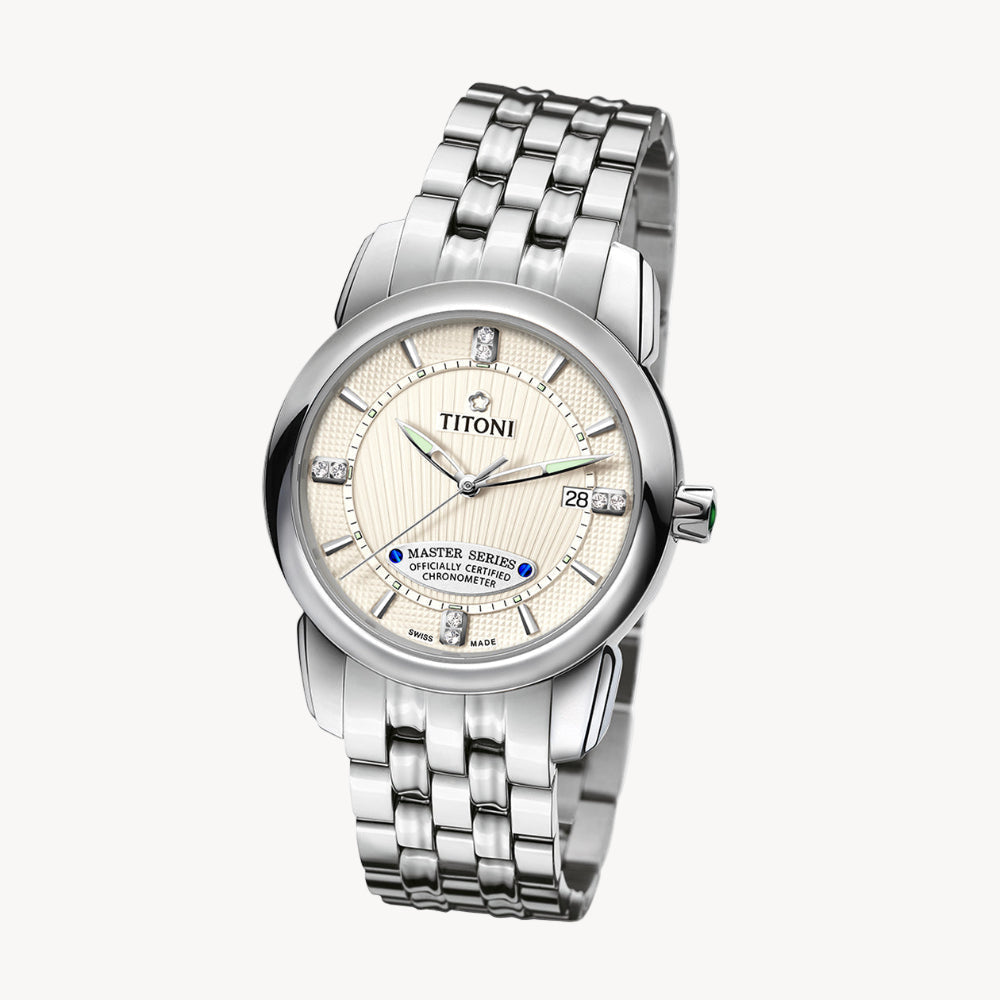 Silver Titoni watch with a white face on a white background