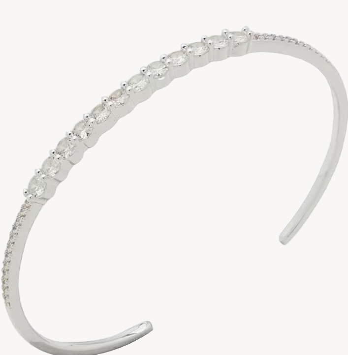 Anne Klein silver tone thin cuff bracelet with crystal detailing, perfect for elegant outfits and special occasions.